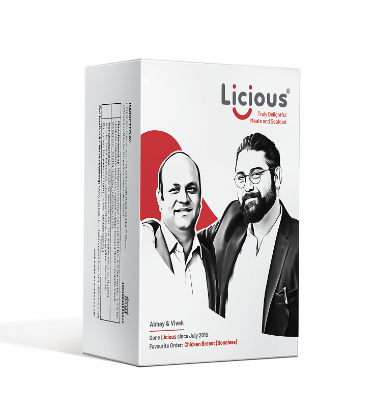 A Licious package on a white background. The box is white with the smiling faces of the Licious founders - Abhay and Vivek on it and the Licious logo in the top right corner.