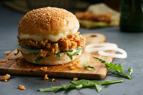 Tasty,Fired,Chicken,With,Arugula,And,Mayonnaise,Sauce,Served,On