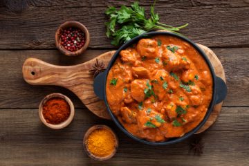 Amritsari Chicken masala on a wooden plate